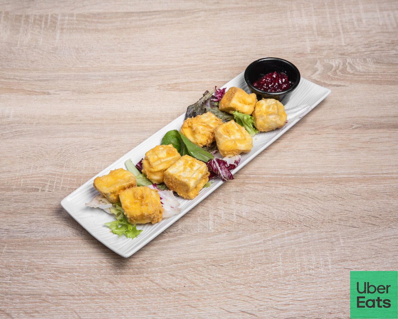 DADOS DE QUESO BRIE CON FRAMBUESA